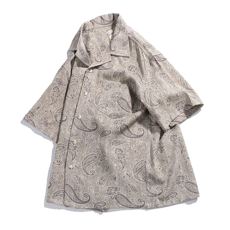 Side angle view of men’s paisley Cuban collar casual shirt
