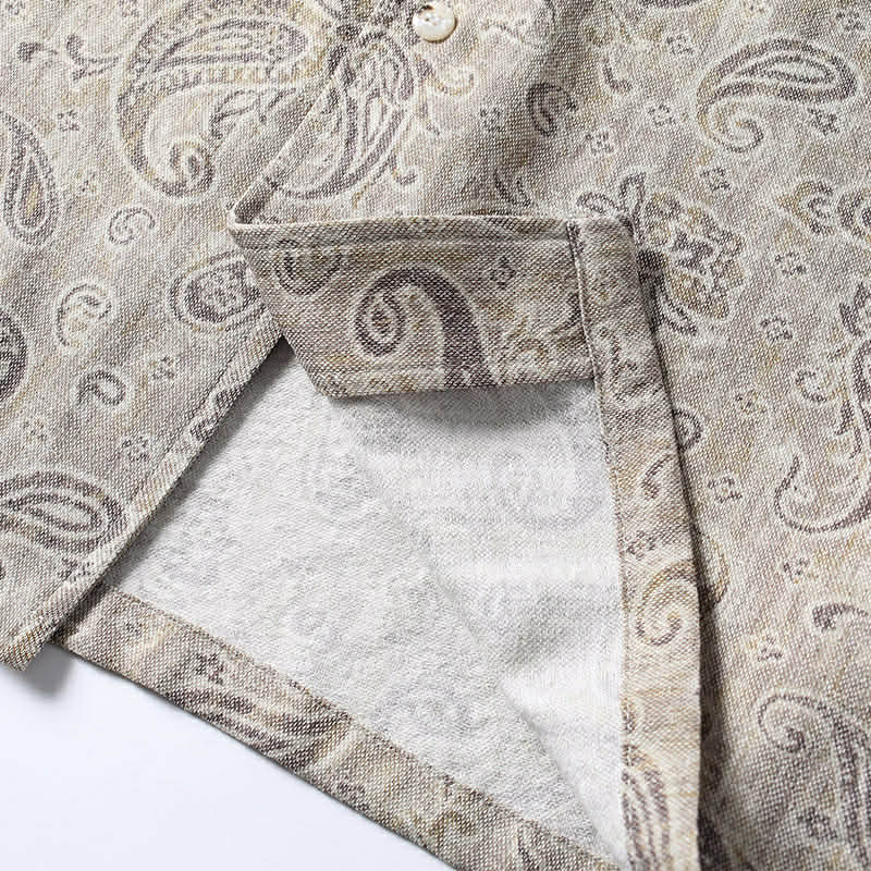 Interior fabric detail of men’s paisley Cuban collar shirt showing material quality and stitching.
