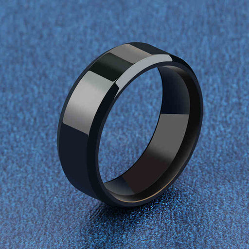 Black minimalist men's ring 8mmpolished band close up.