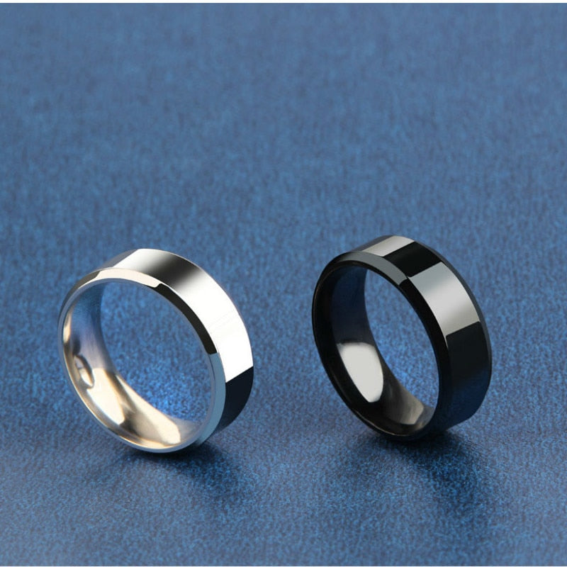 Silver and black men's band rings 8mm minimalist style comparison.