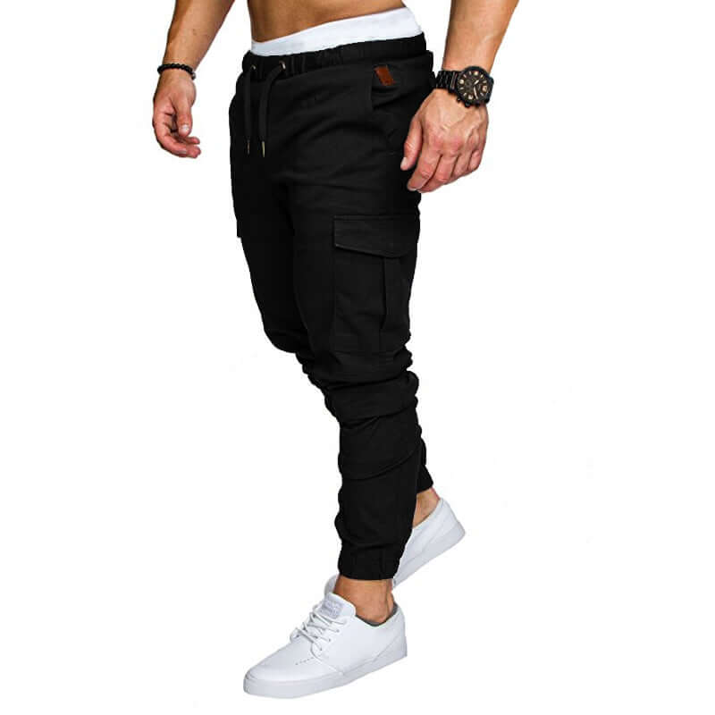 Slim fir cargo joggers for men styled with a casual outfit and white sneakers.