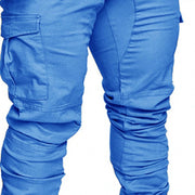 slim fir cargo joggers for men in vibrant blue fabric with functional pockets.