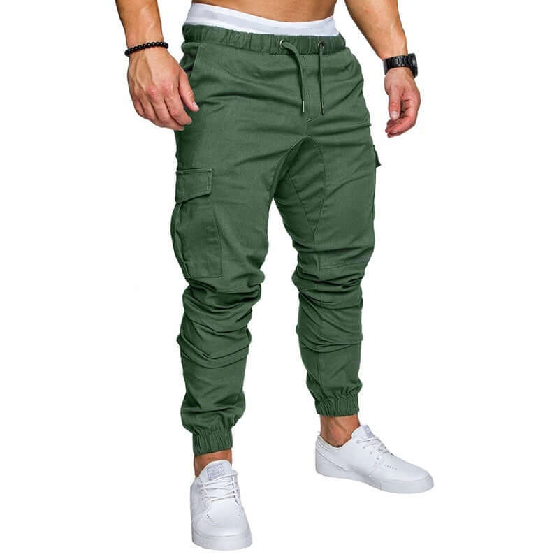slim fir cargo joggers for men in green, featuring elastic cuffs and multiple pockets for style and comfort.