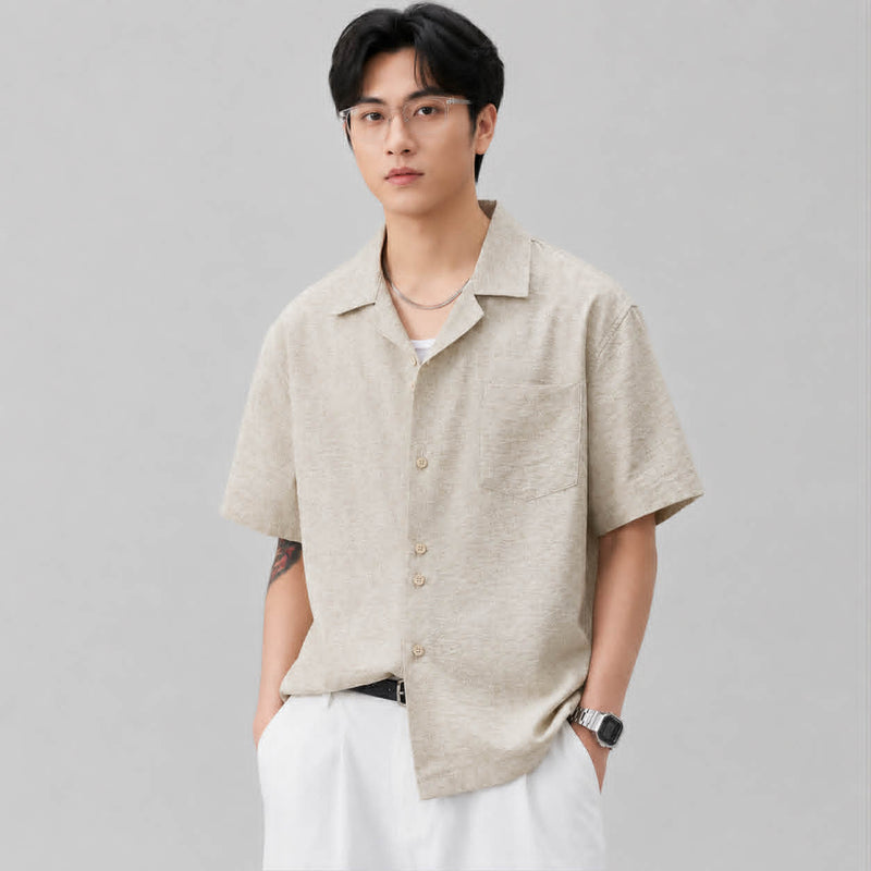 Angled view of men's textured apricot Cuban collar shirt featuring lightweight breathable fabric.
