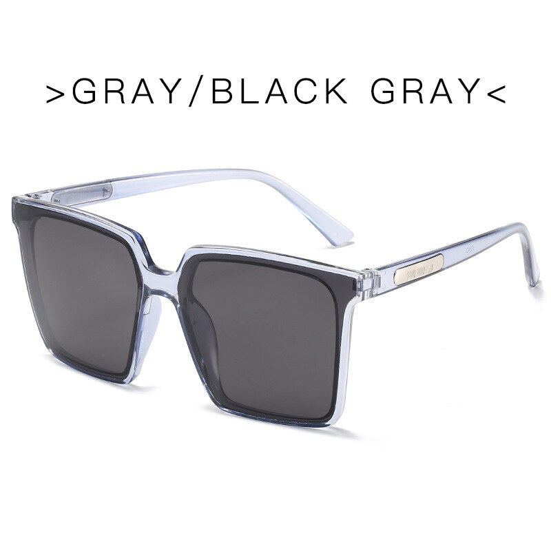 Oversized square sunglasses for women with gray frame and black gray tinted lenses
