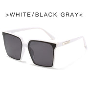 Oversized square sunglasses for women with white frame and black gray oversized lenses
