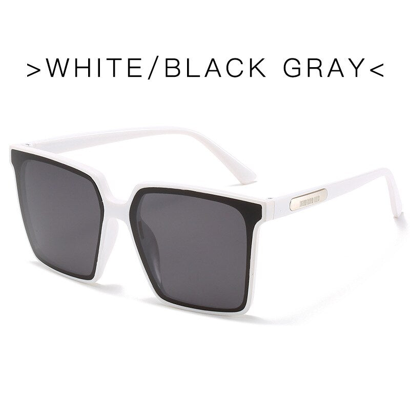 Oversized square sunglasses for women with white frame and black gray oversized lenses
