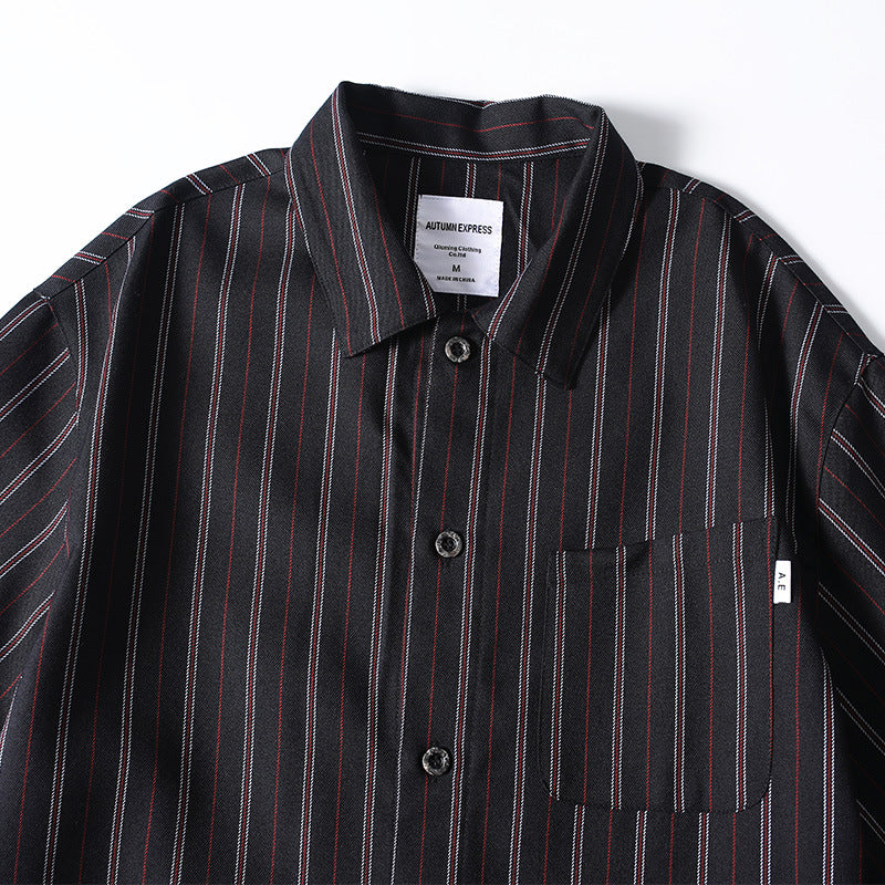 Close-up detail of retro striped shirt collar and pocket

