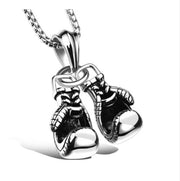 Silver boxing gloves necace pendant on white background