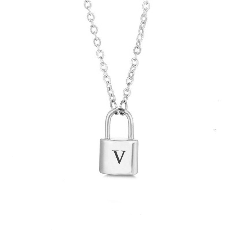 Silver initial lock necklace with letter V pendant on a minimal clean background