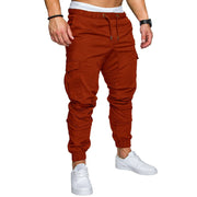 Slim fir cargo joggers for men in a rust color, featuring adjustable waistband and tapered cuffs.