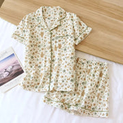Women's floral cotton gauze short sleeve pajama set flat lay
