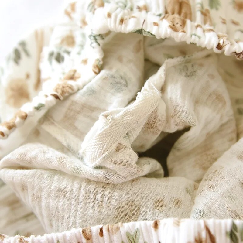 Soft cotton gauze fabric texture with floral print
