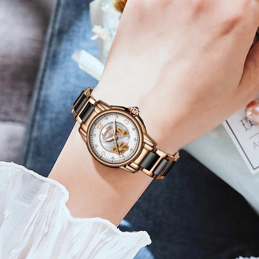 Woman wearing SUNKTA ceramic quartz watch for everyday elegance
