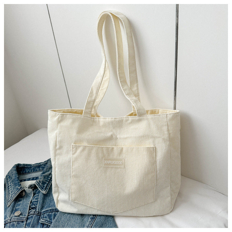 White corduroy tote shoulder bag casual everyday style
