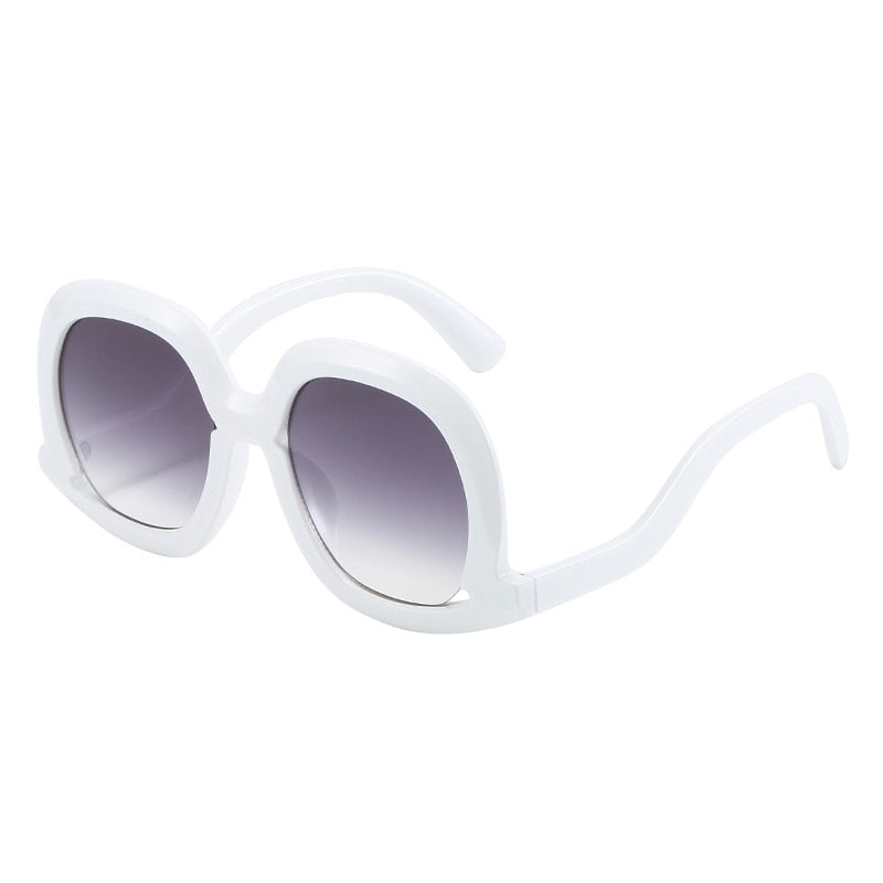 White oversized oval sunglasses with gray gradient lenses featuring a modern luxury fashion design and UV400 protection.
