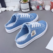 Women’s blue canvas sneakers designed for lightweight comfort and everyday walking.
