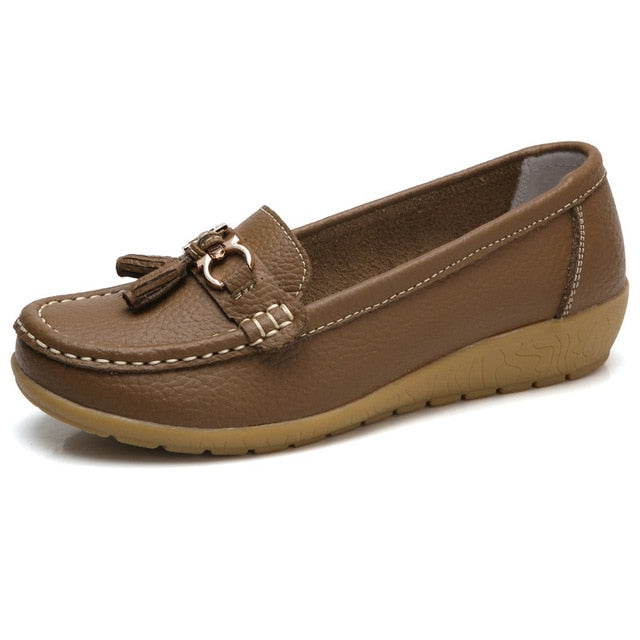 Women’s brown genuine leather slip-on loafers designed for all-day comfort.
