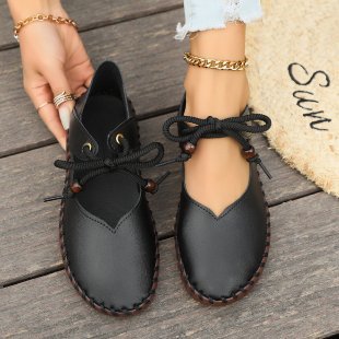 Top view of women’s black casual lace-up sneakers designed for lightweight comfort, walking, and everyday casual style.
