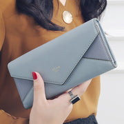 Blue women's designer clutch wallet with slim envelope style
