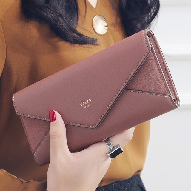 Light brown women's envelope clutch wallet with spacious card and cash storage
