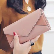 Pink women's designer envelope clutch wallet for shopping, travel, and everyday fashion
