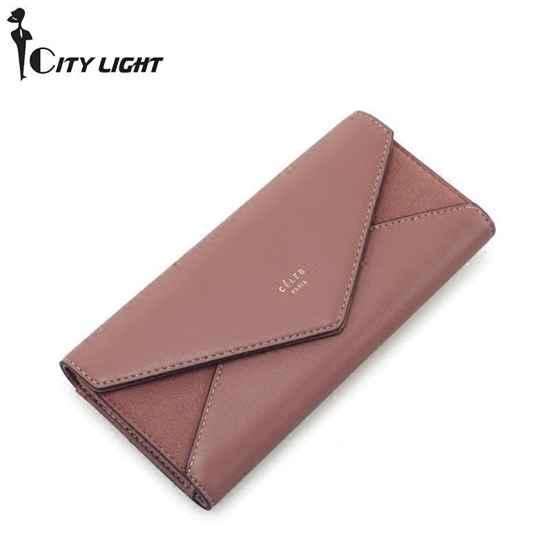 Pink women's envelope clutch wallet with minimalist designer style
