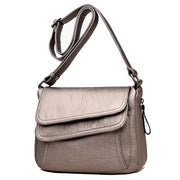 Women's genuine leather crossbody bag in bronze color
