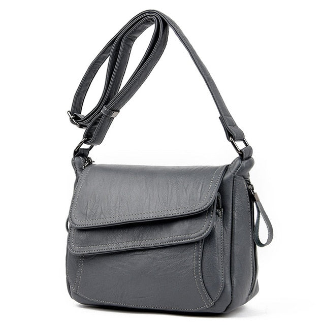 Women's genuine leather crossbody bag in gray color
