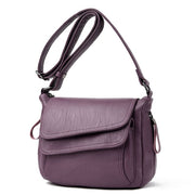 Women's genuine leather crossbody bag in purple color
