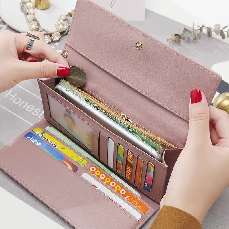 Women's long PU leather wallet interior with multiple card slots, cash compartments, and zipper coin pocket
