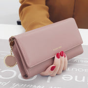 Pink women's long PU leather wallet with elegant fold-over design for daily use
