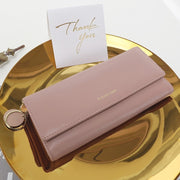 Pink women's long PU leather wallet with stylish slim design and multiple compartments
