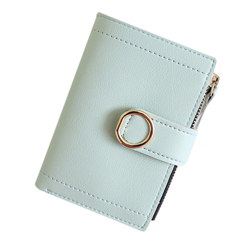 Light green women's mini wallet made from PU leather with secure snap closure.
