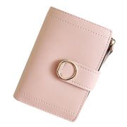 Pink women's compact coin purse wallet with card holder and zip compartment.
