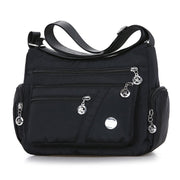 Women’s black nylon crossbody messenger bag with multiple storage compartments
