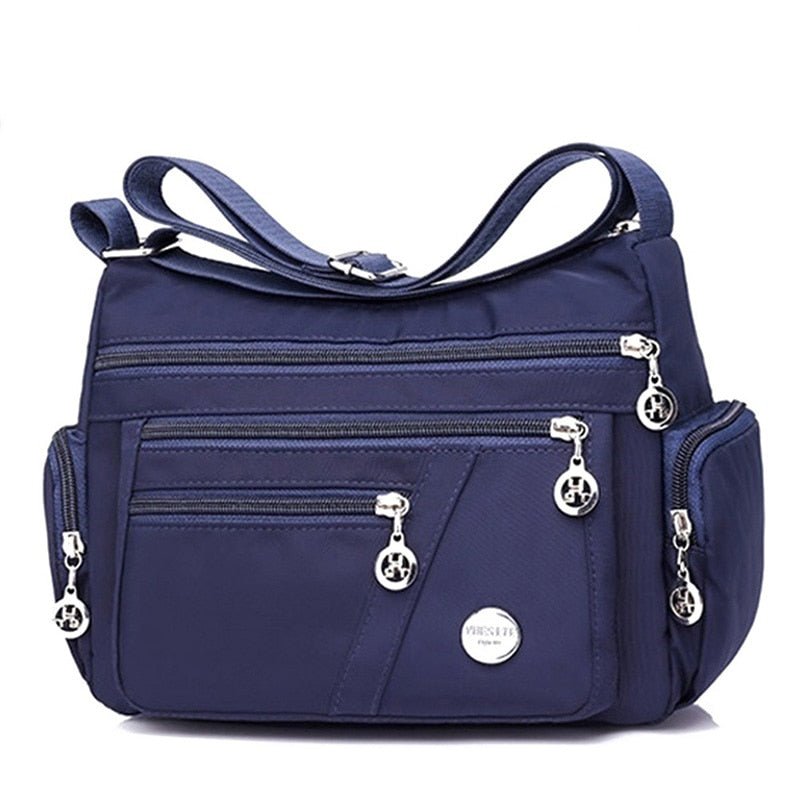 Women’s dark blue nylon messenger shoulder bag with multiple pockets
