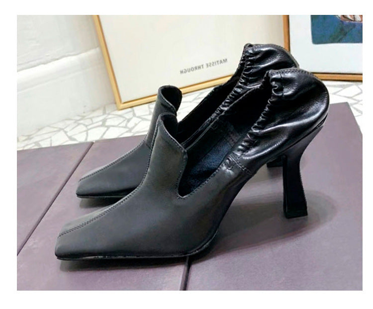 Women’s black square toe mule heels with stiletto heel
