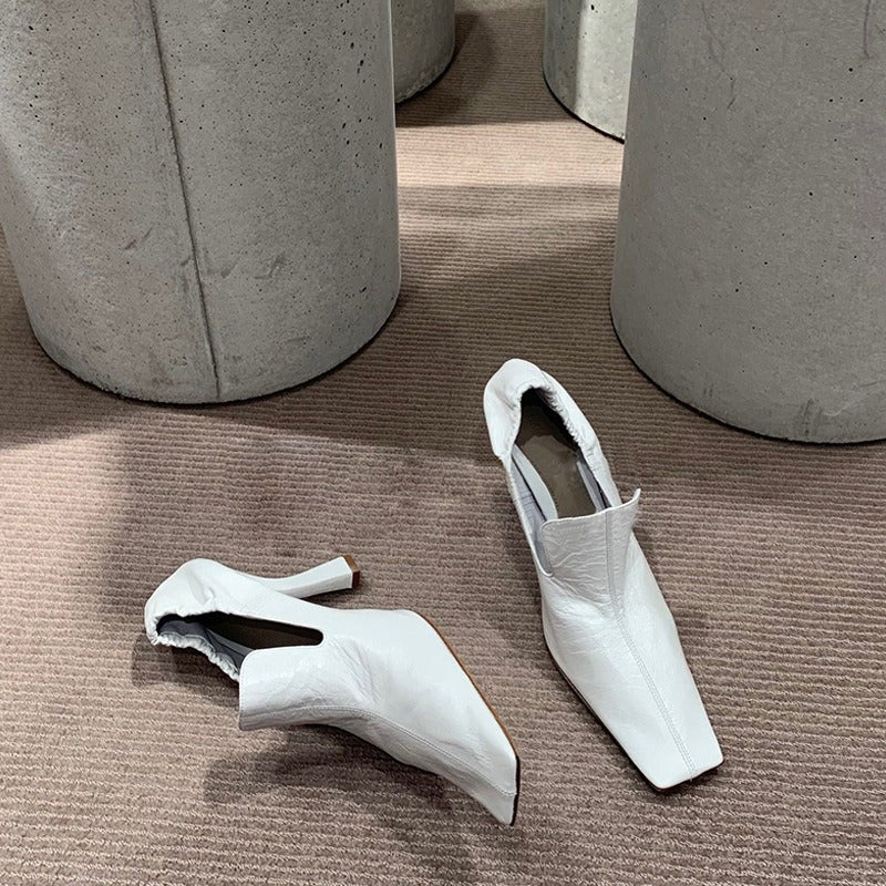 Women’s white square toe mule heels with elegant stiletto heel
