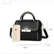 Dimensions of women's structured crossbody handbag measuring 23cm x 16cm x 11cm.
