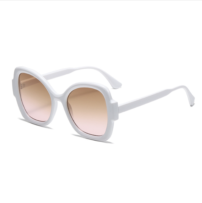 Women’s oversized UV400 sunglasses with white frame and gradient lenses for stylish everyday wear.
